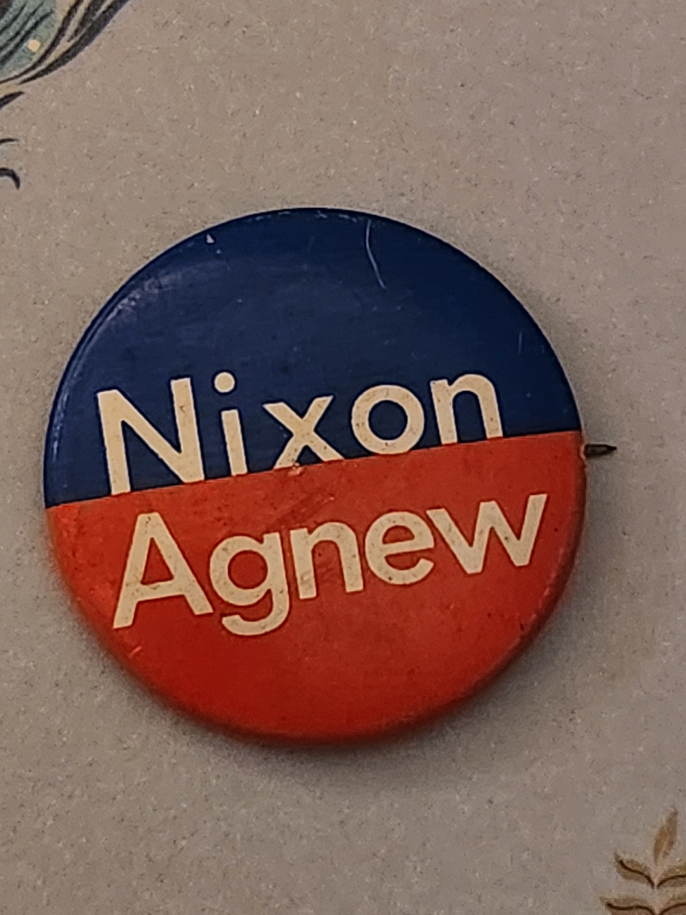 Vintage Nixon Agnew campaign button in blue and red